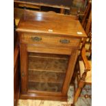 An Edwardian satinwood banded walnut music cabinet, W.59cm, D.36cm, H.94cm