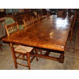 A 17th century style pollard oak extending refectory-style table, 330cm extended (two spare leaves),