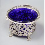 A Victorian pierced silver sugar basket, George John Richards, London, 1850, with blue glass