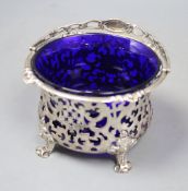 A Victorian pierced silver sugar basket, George John Richards, London, 1850, with blue glass