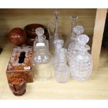 A quantity of cut glass decanters and treen