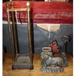 A late Victorian brass and cast iron stick, H.63cm, together with an umbrella stand and three cast