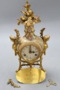 A Victoria & Albert 'Marie Antoinette' mantel clock, height 38cm