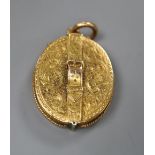 A Victorian engraved yellow metal oval locket , with belt and buckle motif, 26mm, gross 10.4
