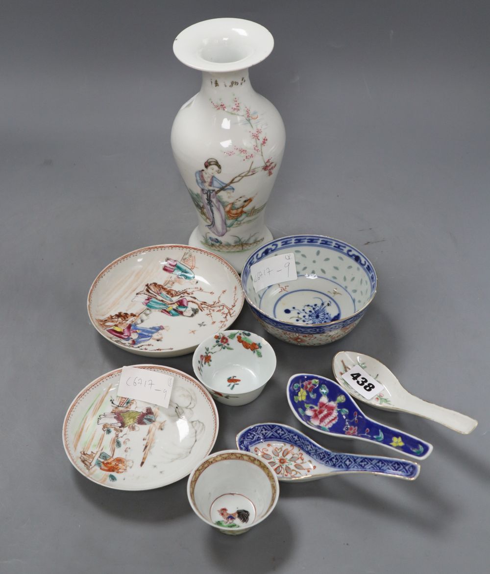 Two 18th century Chinese famille rose tea bowls and two saucers, together with three rice spoons and