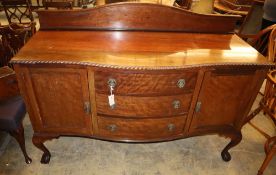 A 1920's Chippendale revival mahogany bow fronted sideboard, W.152cm, D.60cm, H.115cm