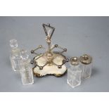 A stylish Victorian silver cruet stand, by Hukin and Heath, Birmingham, 1885, with four matching