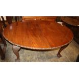 A 1920's Chippendale revival mahogany extending dining table, 210cm extended (two leaves and