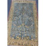 A Qum carpet, 254 x 156cmCONDITION: Slightly faded with wear to blue ground, no rips or tears