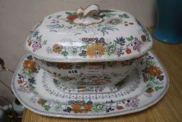 A Davenport stone china soup tureen and cover and a meat platter, printed and painted with