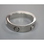 A Cartier 750 white metal Love ring, numbered 52833A, size 3.8 grams.CONDITION: Minor surface