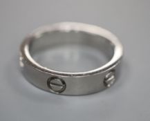 A Cartier 750 white metal Love ring, numbered 52833A, size 3.8 grams.CONDITION: Minor surface