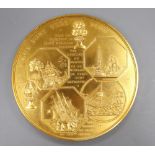 A gold plated medallion