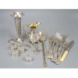 Assorted silver including a Victorian silver cream jug, silver posy vase, four silver napkin