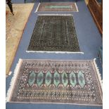 A Pakistan Bokhara prayer rug and two other rugs, largest 190 x 127cm