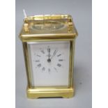 A modern gilt brass enamel dial upright rectangular striking carriage clock, signed Angelus to white