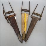 Three Mughal Indian katars in their sheaths