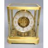 A Jaeger Le Coultre Atmos brass four glass clock, height 23.5cm width 21cm