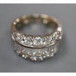 A modern 18ct white gold and three row baguette and round cut diamond set dress ring, by Picchiotti,