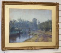 J. H. Vignoles Fisher (1864-1945), watercolour, Bargeman besides loch gates, signed, 52 x 69cm