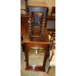 A small oak gateleg table, 80cm extended, W.72cm, H.70cm and a mahogany-framed wall mirror