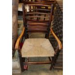 A 19th century Sussex elbow chair