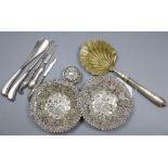 A pair of Edwardian pierced repousse silver bonbon dishes, Birmingham, 1901, 11.8cm, a similar