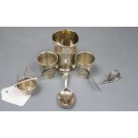 A pair of Russian (1927-1958) white metal and niello tots, a beaker, a strainer? and a spoon and
