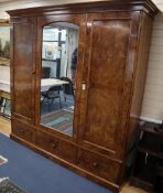 A large Victorian burr walnut triple wardrobe stamped Holland & Sons, W.220cm, D.61cm, H.228cm