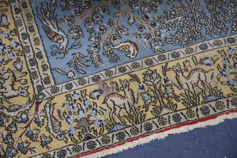 A Qum carpet, 254 x 156cmCONDITION: Slightly faded with wear to blue ground, no rips or tears - Image 2 of 4