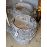 A pair of circular reconstituted stone garden planters, 40cm diameter, H.40cm