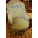 A late Victorian tub armchair