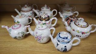 Twelve porcelain teapots, reproductions of 18th and 19th century originals