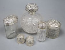 A late Victorian silver mounted cut glass scent bottle, Chester, 1900 and five silver mounted toilet