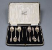 A George V cased set of six silver teaspoons, and pair of sugar tongs, Sheffield, 1924, 3oz.