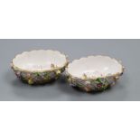 A pair of Helena Wolfsohn Dresden oval basket moulded salts, painted with harbour scenes and