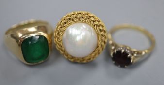 A 750 and mabe pearl set dress ring, size O, gross 8.5 grams, a 14k and green paste set ring, size