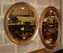 Two gilt-framed oval wall mirrors, larger 70 x 100cm