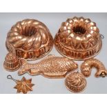 Seven 19th century copper jelly moulds