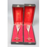Two cased Stuart Devlin parcel gilt silver champagne flutes, London, 1980, numbered 546 & 191, 22.