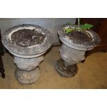 A pair of reconstituted stone campana garden urns, 40cm diameter, H.50cm