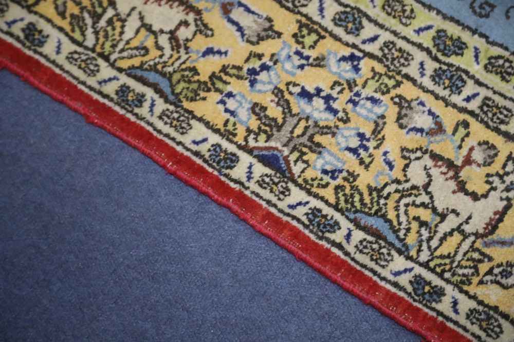 A Qum carpet, 254 x 156cmCONDITION: Slightly faded with wear to blue ground, no rips or tears - Image 4 of 4