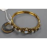 A paste set gilt metal bangle and a similar dress ring.