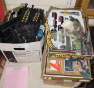 A collection of 00 Gauge trains and scalextric cars and tracking