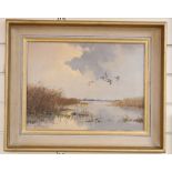G Stevens, oil on canvas, Marshland with ducks in flight, signed, 29 x 40cm signed, 12 x 16in.
