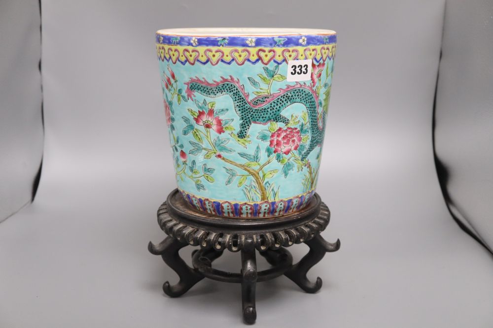 A Chinese turquoise glazed 'dragon' jardiniere and wood stand, overall 33cm - Image 4 of 5
