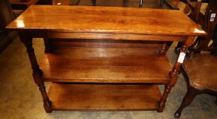 A three tier oak buffet, W.116cm, D.40cm, H.84cm