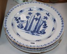 A set of three 18th century Delft chargers, diameter 37cm, two a.f.