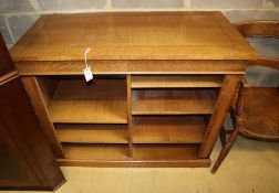 A modern light oak open bookcase, with adjustable shelves, W.110cm, D.52cm, H.90cm