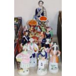A collection of ten Staffordshire pottery figures and groups
